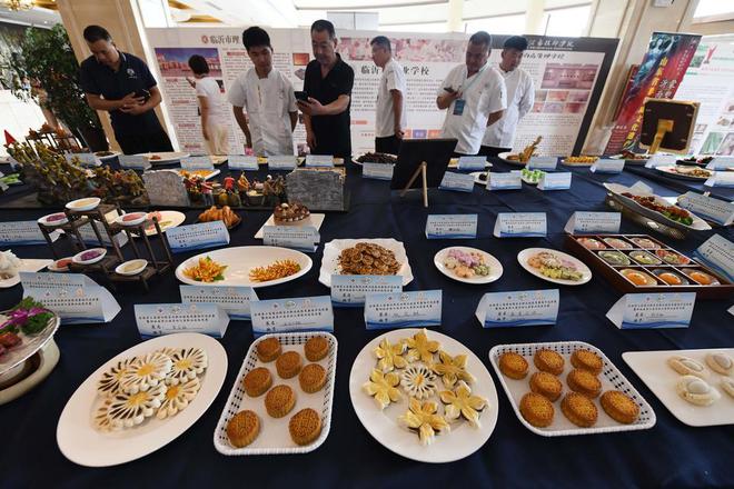 大厨高手同台竞技全国商业服务业山东赛区烹饪比赛欢乐举行(图1)