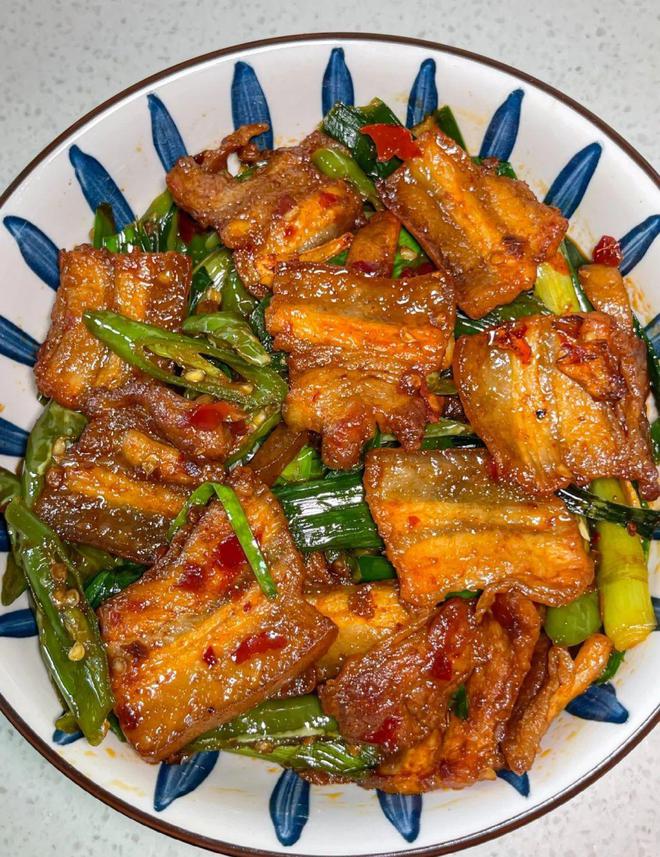 九游娱乐文化：川味经典：回锅肉的香醇之旅(图1)