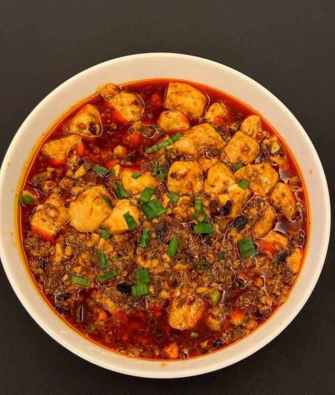 九游娱乐：舌尖上的四川：品味麻婆豆腐的麻辣诱惑(图2)