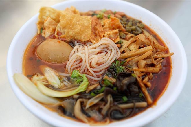 九游娱乐：威观广西：“嗍粉”界的王柳州螺蛳粉入选首批中国消费名品名单(图1)