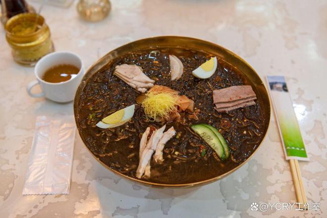 九游娱乐文化：朝鲜美食之旅：平壤至咸兴的味蕾探索(图2)